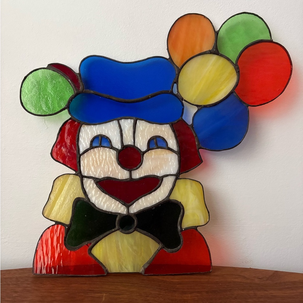 Vibrant Stained Glass Clown Art with Balloons
